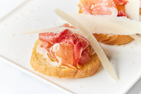 Prosciutto, Parmesan & Truffle Oil Crostini